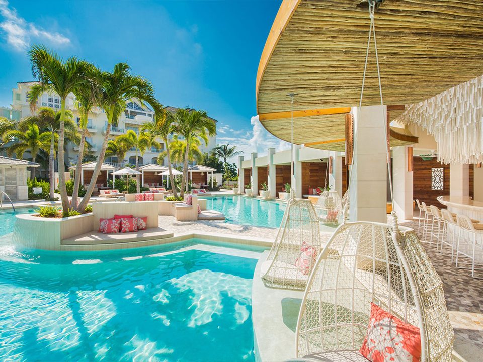 Swing chairs and loungers around the Colonnade Pool