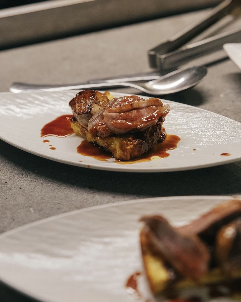 Seared foie gras on toasted brioche with a glossy sauce, a course at Ode to Gillian