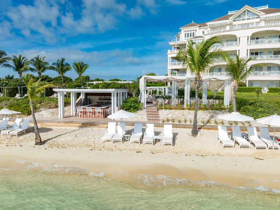 Sea Grapes and its loungers seen from the beach