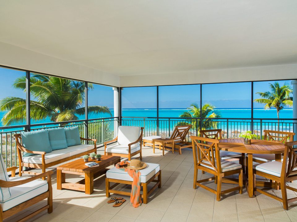 The wraparound balcony of a One Bedroom Oceanfront Deluxe suite