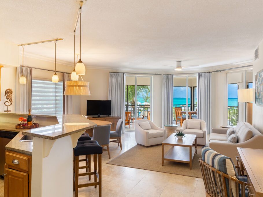 A one-bedroom suite living area with its kitchen