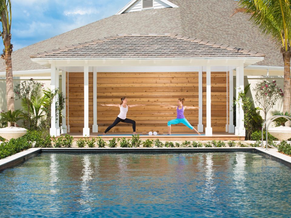Yoga in the pavilion beside the pool